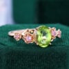 Oval Cut Peridot Engagement Ring With Cherry Blossom Accents (1)