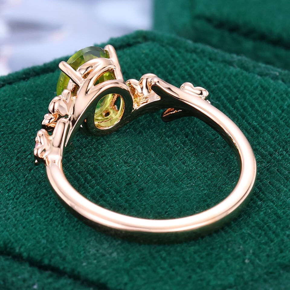 Oval Cut Peridot Engagement Ring With Cherry Blossom Accents (5)