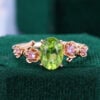 Oval Cut Peridot Engagement Ring With Cherry Blossom Accents (6)