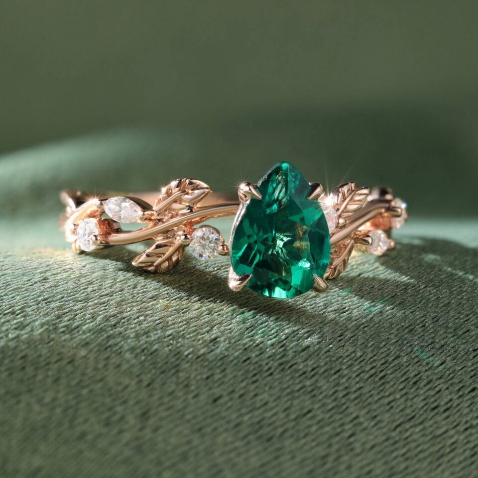 Pear Cut Emerald Engagement Ring With Leaf Accents (1)