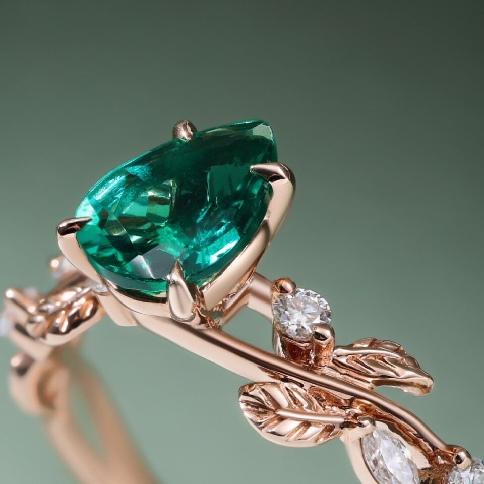 Pear Cut Emerald Engagement Ring With Leaf Accents (2)