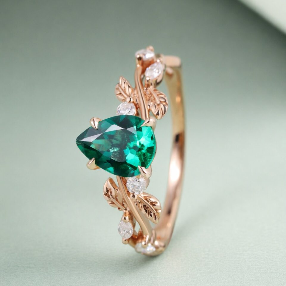 Pear Cut Emerald Engagement Ring With Leaf Accents (3)