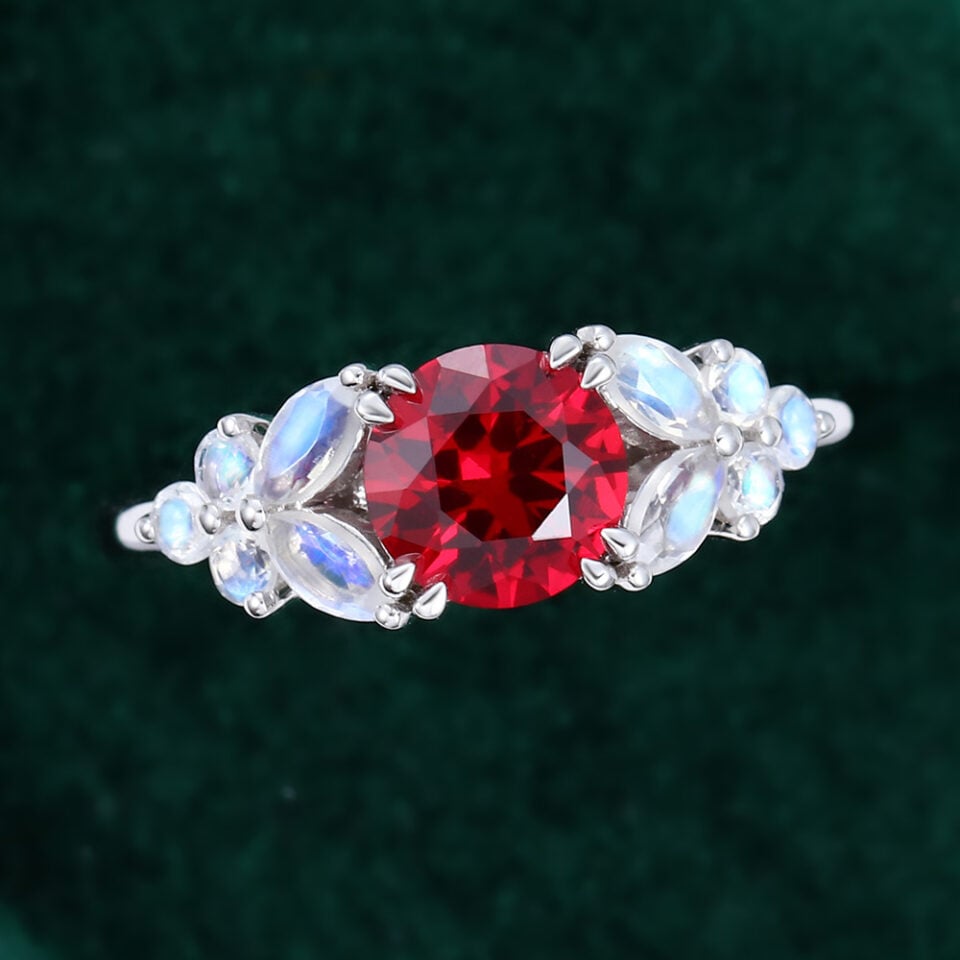 Round Cut Ruby Blossom Engagement Ring With Moonstone Cluster Accents (1)