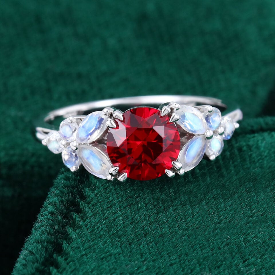 Round Cut Ruby Blossom Engagement Ring With Moonstone Cluster Accents (3)