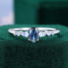 Tapered Line | Oval Cut White Gold Alexandrite Engagement Ring with Moonstone Accents