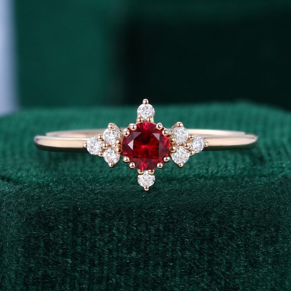 Round Cut Ruby Engagement Ring With Diamond Cluster Accents