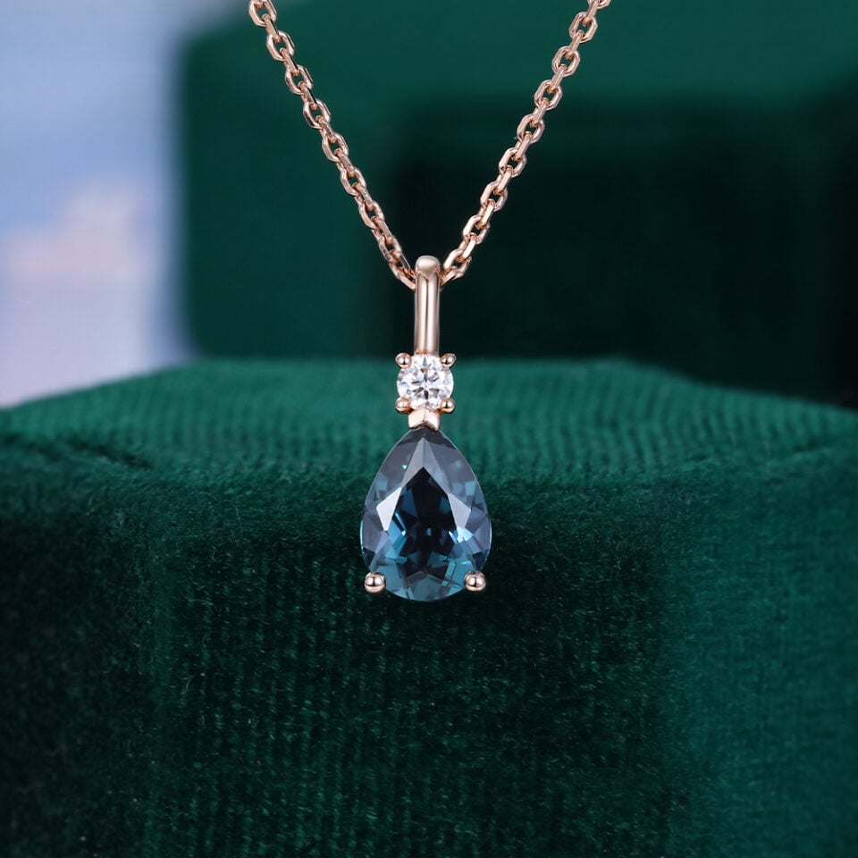 Pear cut alexandrite & diamond two stone pendant necklace