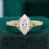 Vintage Inspired Marquise Cut Moissanite Engagement Ring with Teal Sapphire Accents