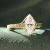 Vintage Inspired Marquise Cut Moissanite Engagement Ring with Teal Sapphire Accents (2)