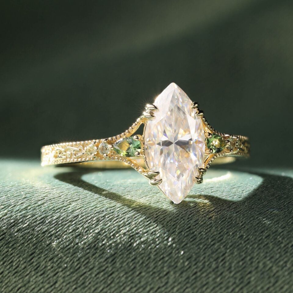 Vintage Inspired Marquise Cut Moissanite Engagement Ring with Teal Sapphire Accents (2)