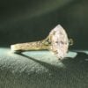 Vintage Inspired Marquise Cut Moissanite Engagement Ring with Teal Sapphire Accents (3)