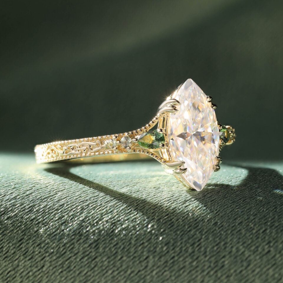 Vintage Inspired Marquise Cut Moissanite Engagement Ring with Teal Sapphire Accents (3)
