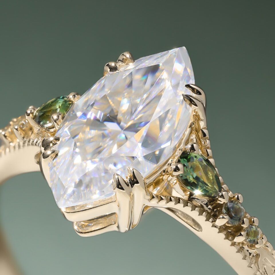 Vintage Inspired Marquise Cut Moissanite Engagement Ring with Teal Sapphire Accents (4)