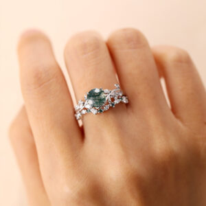 white gold round moss agate ring set on hand