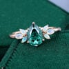 Pear Shaped Green Moissanite Engagement Ring with Opal Side Stones (3)