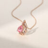 Crescent vine pear cut pink sapphire pendant necklace