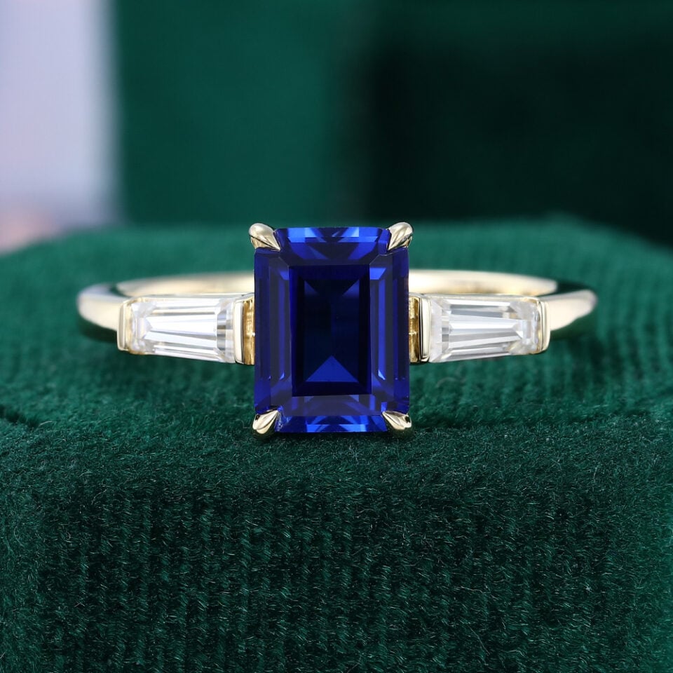 Art Deco Emerald Cut Sapphire Three Stone Engagement Ring with Baguette Accents