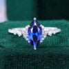 Marquise Cut Sapphire Engagement Ring With Moissanite Cluster Accents