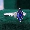Marquise Cut Sapphire Engagement Ring With Moissanite Cluster Accents (11)
