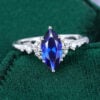 Marquise Cut Sapphire Engagement Ring With Moissanite Cluster Accents (13)