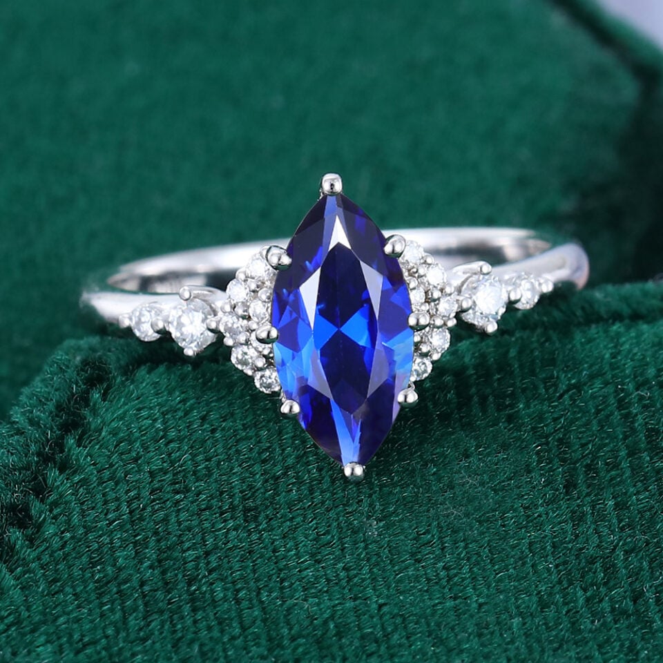 Marquise Cut Sapphire Engagement Ring With Moissanite Cluster Accents (13)