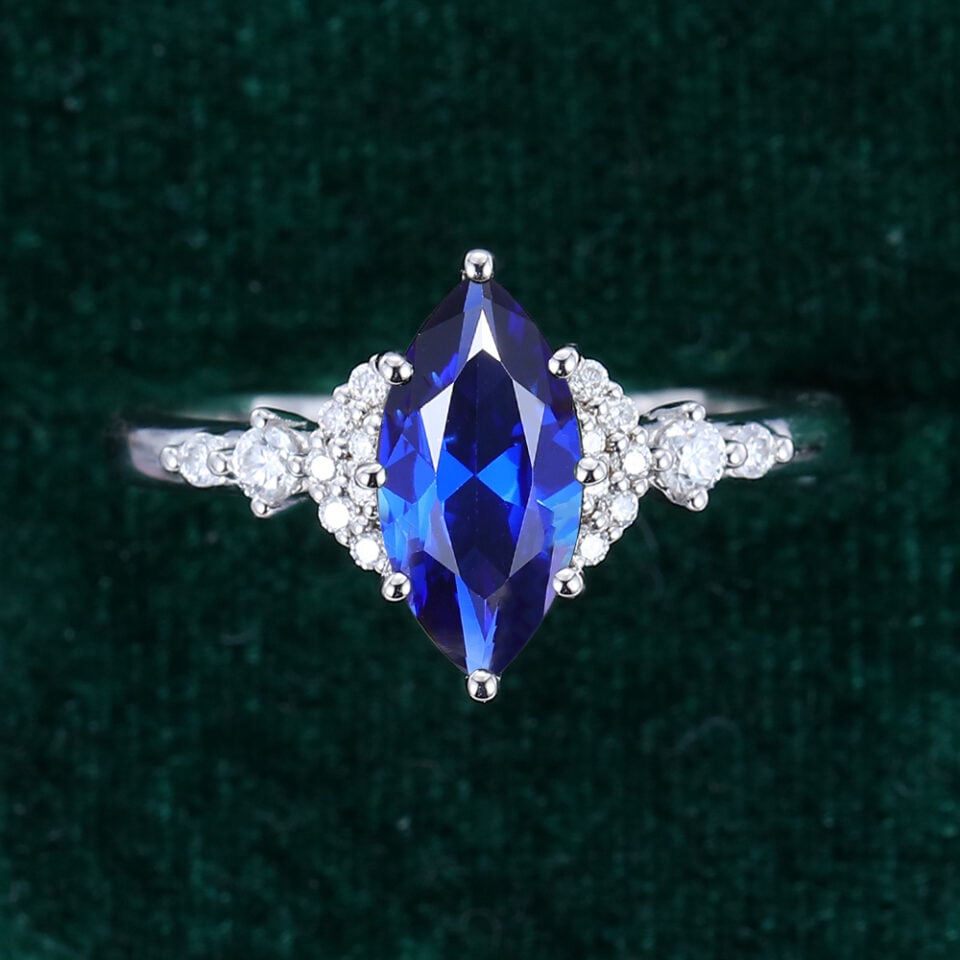 Marquise Cut Sapphire Engagement Ring With Moissanite Cluster Accents (9)