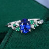 Nature Inspired Oval Cut Sapphire Cluster Engagement Ring with Leaf Prong (20)