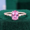 Oval Cut Pink Sapphire Leaf Engagement Ring with Trio Tapered Accents
