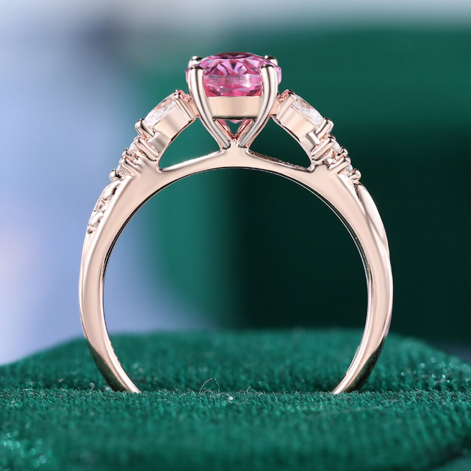 Oval Cut Pink Sapphire Leaf Engagement Ring with Trio Tapered Accents (27)