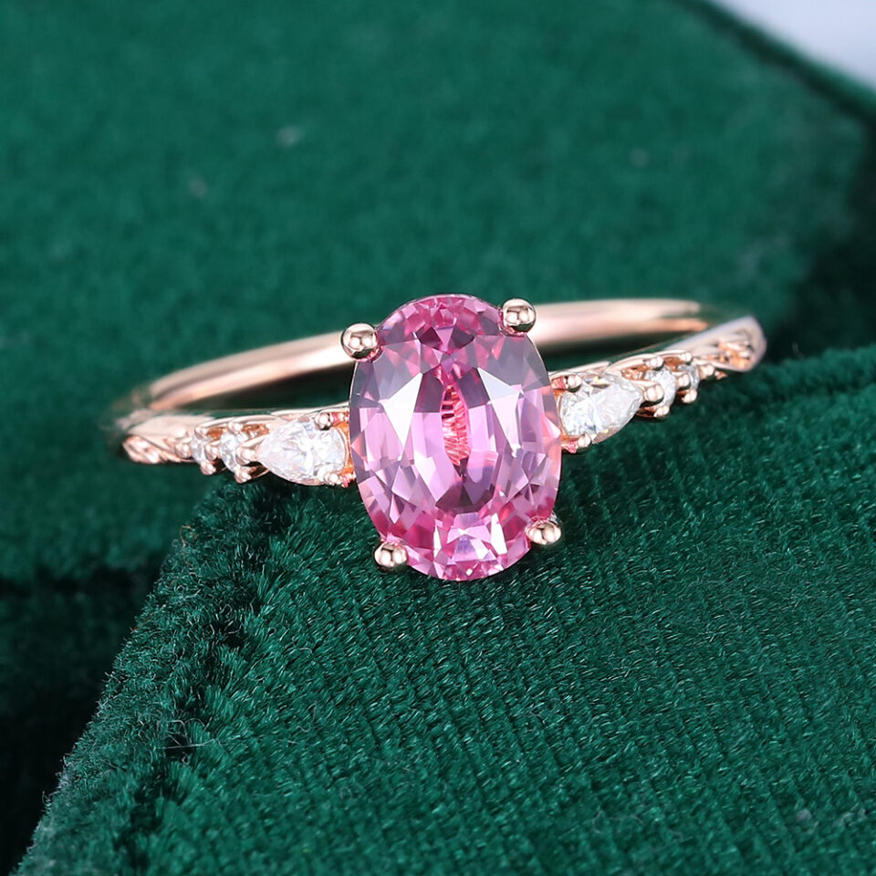 Oval Cut Pink Sapphire Leaf Engagement Ring with Trio Tapered Accents (28)