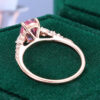 Oval Cut Pink Sapphire Leaf Engagement Ring with Trio Tapered Accents (29)