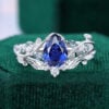 Pear Cut Sapphire Nature-Themed Bridal Ring Set With Leaf Accents