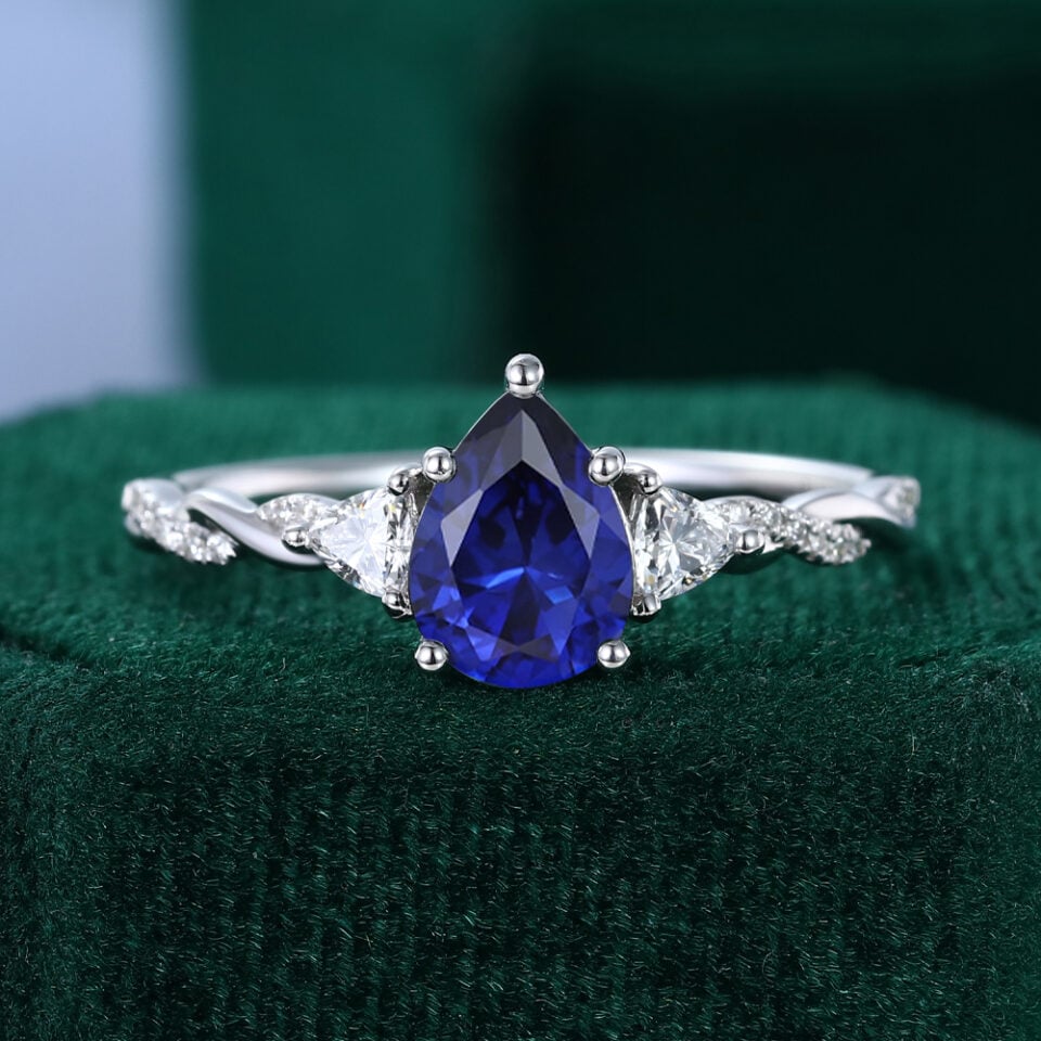 Pear Cut Sapphire Three Stone Engagement Ring With Unique Twisted Shank