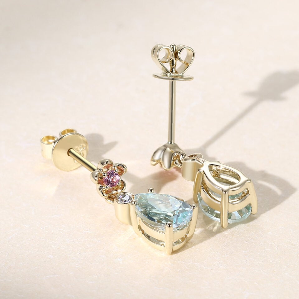 Floral Inspired Pear Cut Aquamarine Dangle Earrings With Cherry Blossom Accents