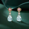 Floral Inspired Pear Cut Aquamarine Dangle Earrings With Cherry Blossom Accents