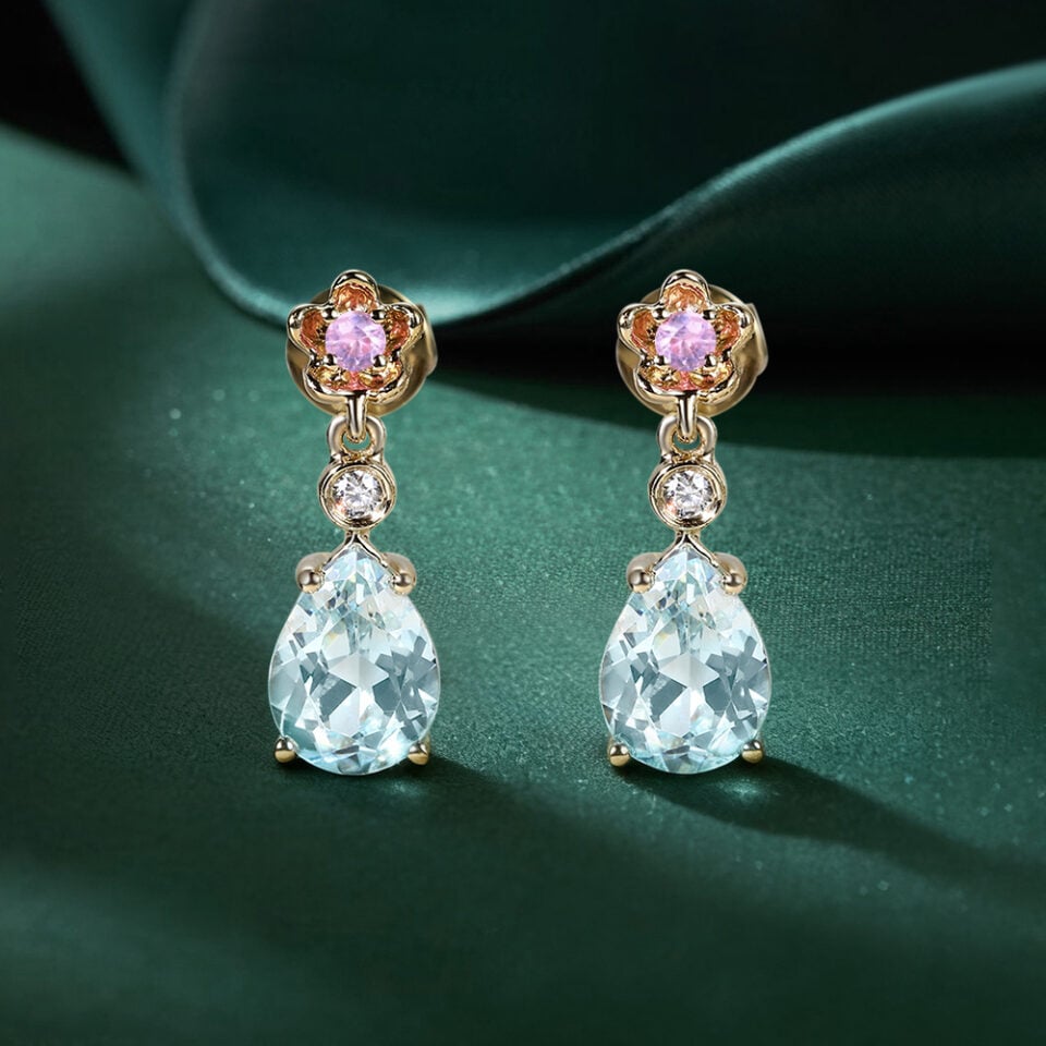 Floral Inspired Pear Cut Aquamarine Dangle Earrings With Cherry Blossom Accents