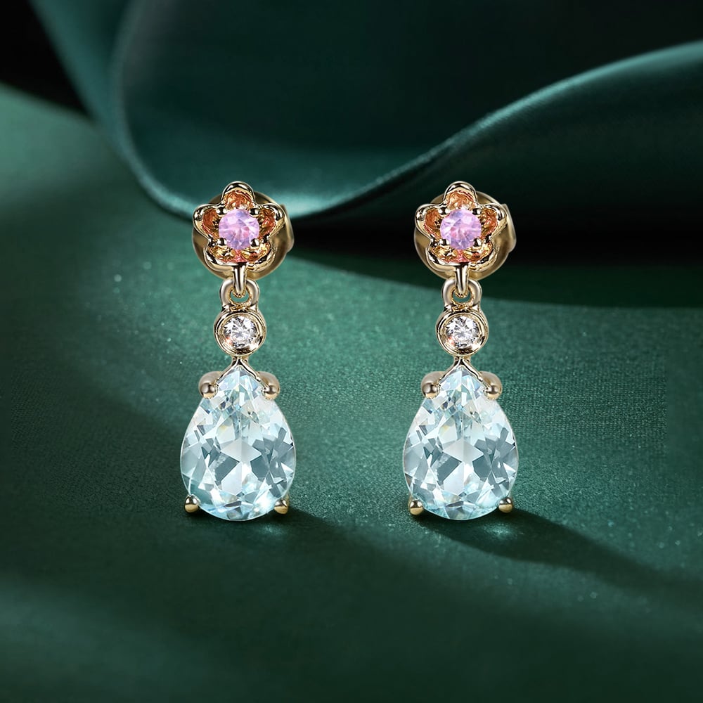 Floral Inspired Pear Cut Aquamarine Dangle Earrings With Cherry Blossom Accents