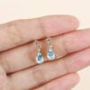 Floral Inspired Pear Cut Aquamarine Dangle Earrings With Cherry Blossom Accents (3)
