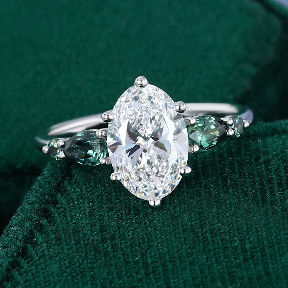 Oval Cut Lab Diamond Engagement Ring with Teal Sapphire Accents (12)
