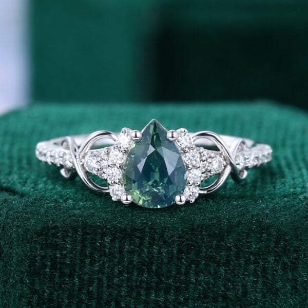 1 Carat Pear Cut Teal Sapphire Infinity Pavé Engagement Ring