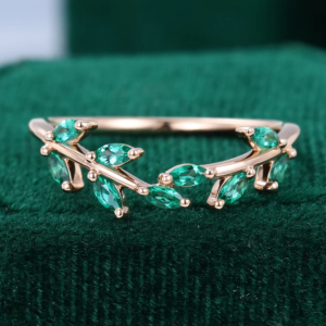 marquise cut emerald curved wedding band