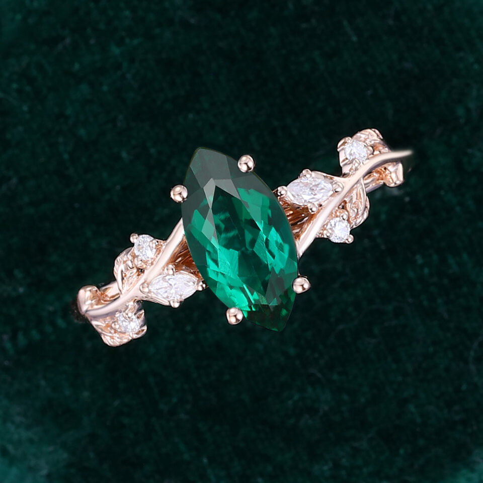 Nature Inspired Marquise Cut Emerald Engagement Ring with Hidden Detail (1)