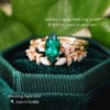 Nature inspired marquise cut emerald engagement ring with hidden detail
