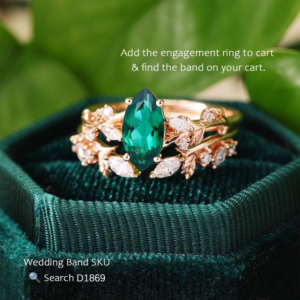 Nature inspired marquise cut emerald engagement ring with hidden detail