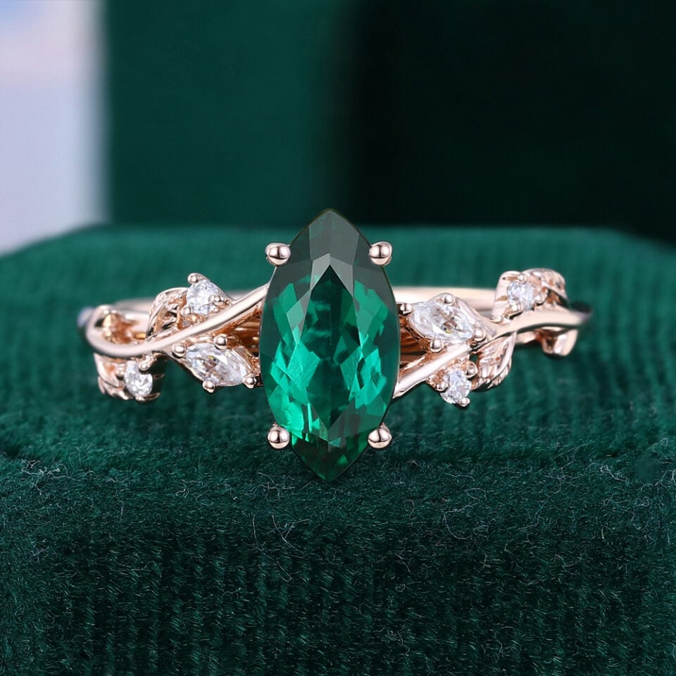 Nature Inspired Marquise Cut Emerald Engagement Ring with Hidden Detail
