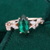 Nature inspired marquise cut emerald engagement ring with hidden detail