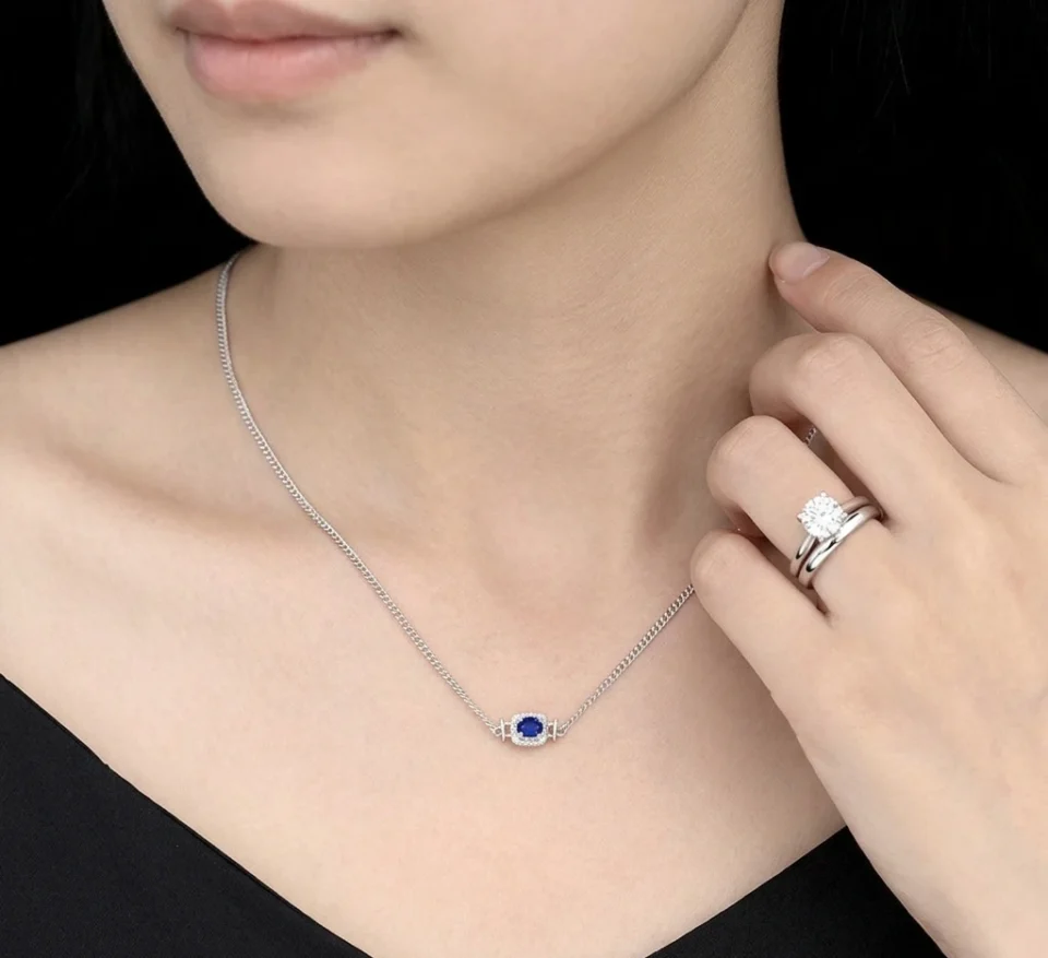 Oval cut lab-grown sapphire necklace matching an engagement ring