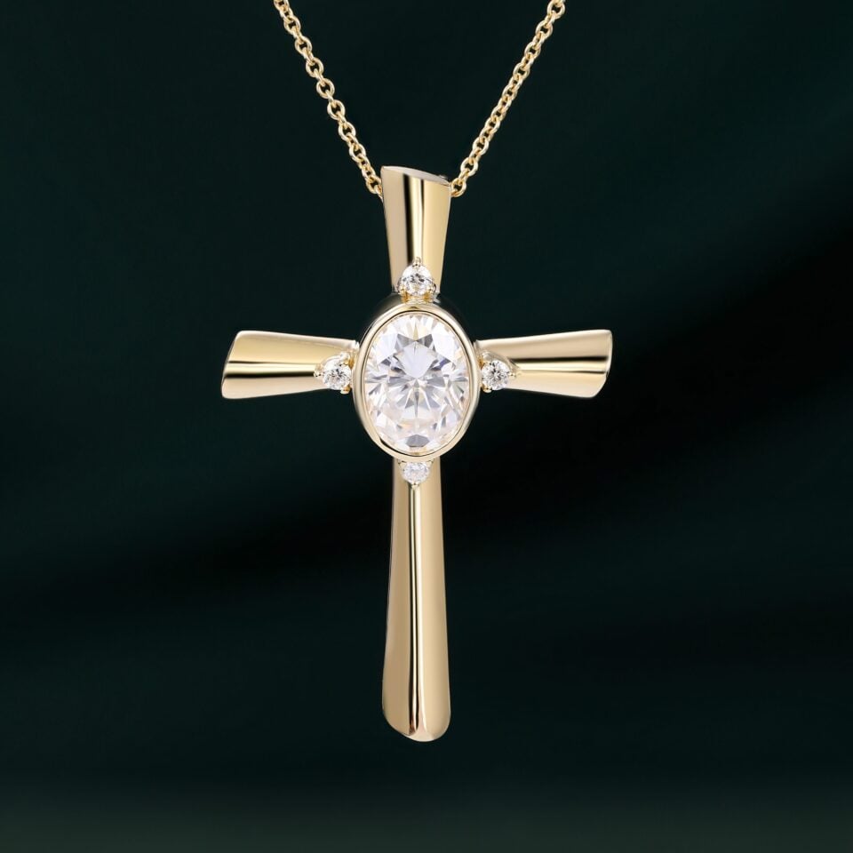 Bezel Set Oval Cut Moissanite Cross Pendant Necklace with Diamond Accents