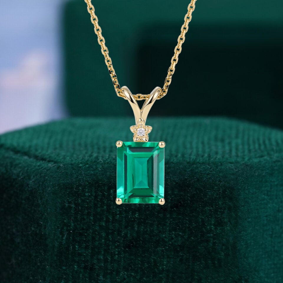 Emerald Cut Emerald Pendant Necklace With Floral Diamond Accents