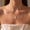 Emerald Cut Moissanite Pendant Necklace With Floral Diamond Accents (12)